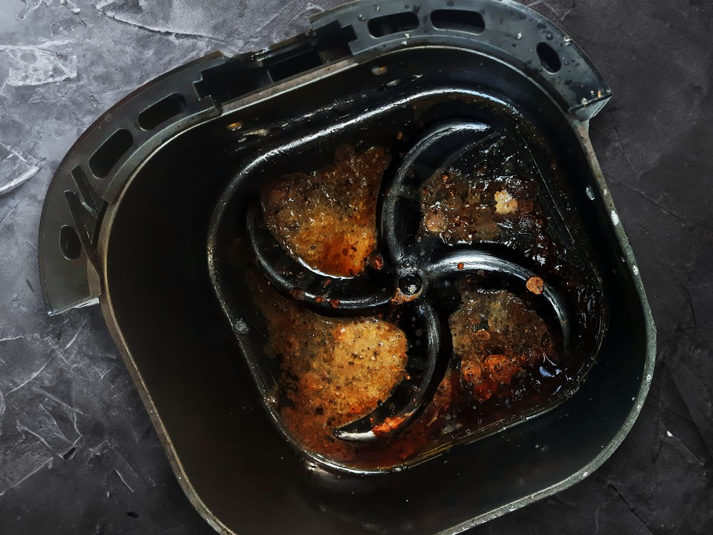 Air fryer suja — Foto: Getty Images/Adisak Mitrprayoon