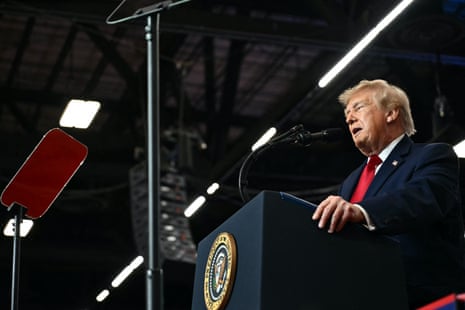 Man stands behind lectern