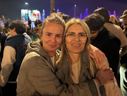 Tamara, left, celebrates in Belgrade with thousands of others following the victory of the Students’ List movement.